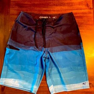 Like new condition, Swim trunks, O’Neil, size 30, tie, no liner, side zip pckt